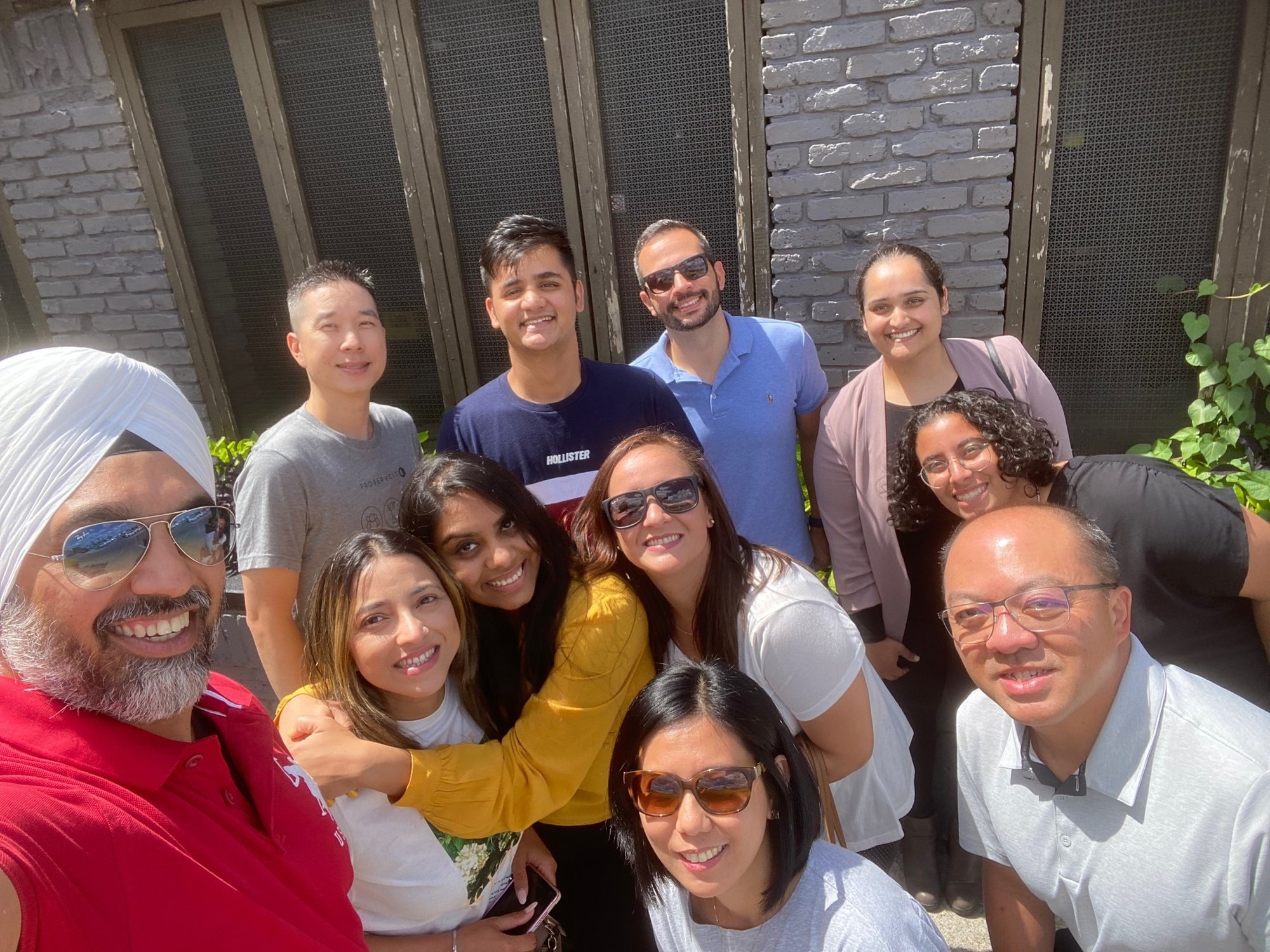 ProServeIT team members taking a selfie together during a lunch event