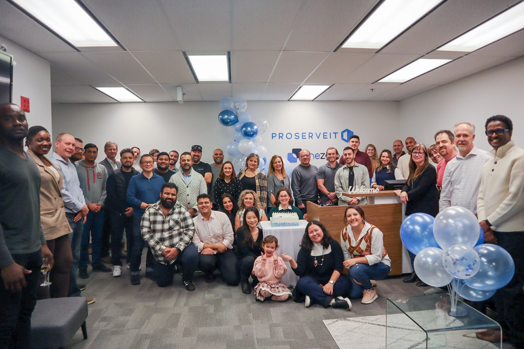 the ProServeIT team celebrating at the office