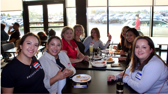 ProServeIT team members at a dinner