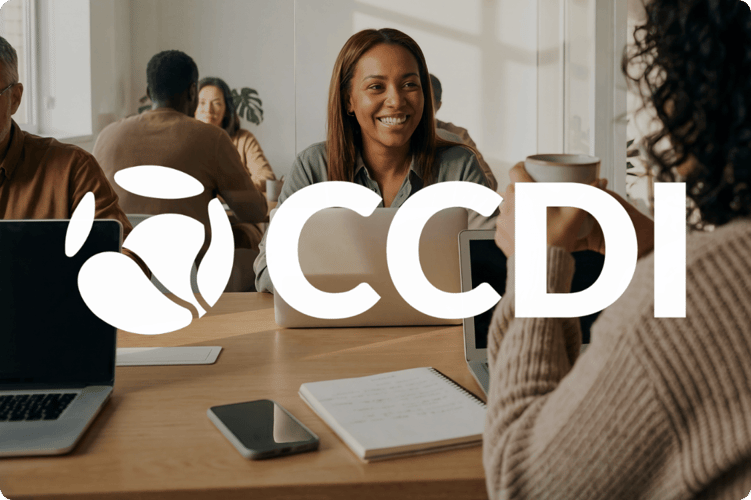 A diverse group of people working together, representing the Canadian Centre for Diversity and Inclusion, a ProServeIT cybersecurity client in the nonprofit and education sector