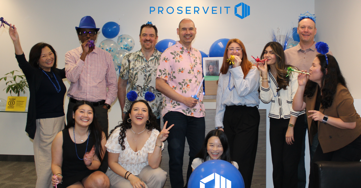ProServeIT team members gathered together to celebrate ProServeIT winning the 2024 Microsoft Partner of the Year award, reflecting company culture and community.