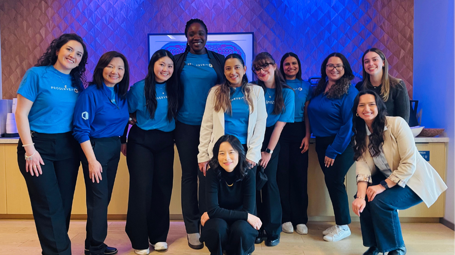 EmpowerWomen Team group photo of team members gathered at an EmpowerWomen event