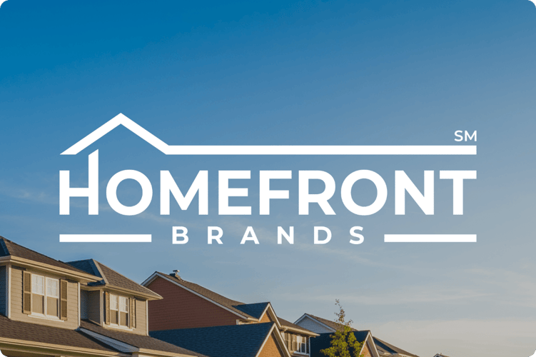 Homefront Brand Case Study Card: Aerial view of a residential community developed by Homefront Brands, featuring neighborhoods and homes supported through technology solutions and digital transformation initiatives highlighted in the Homefront Brand case study.