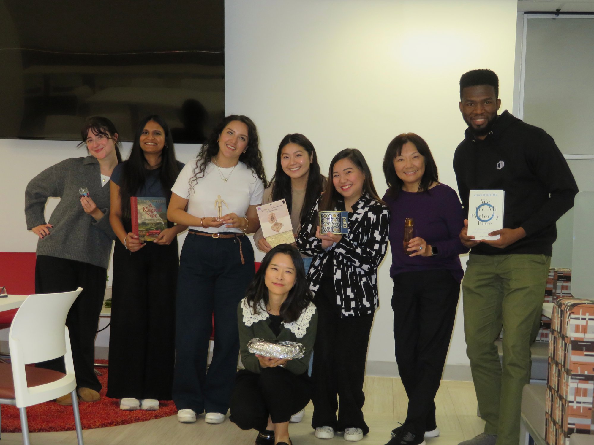 the ProServeIT marketing team pictured after a gift swap