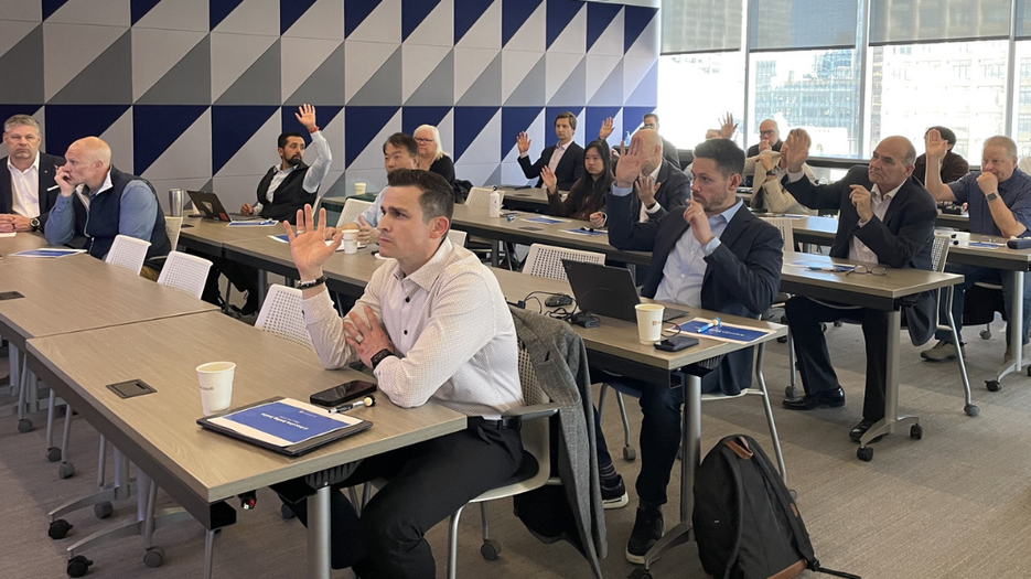  Industry AI EBS Calgary Event - attendees participating in an AI-focused business event, seated classroom-style during a presentation session