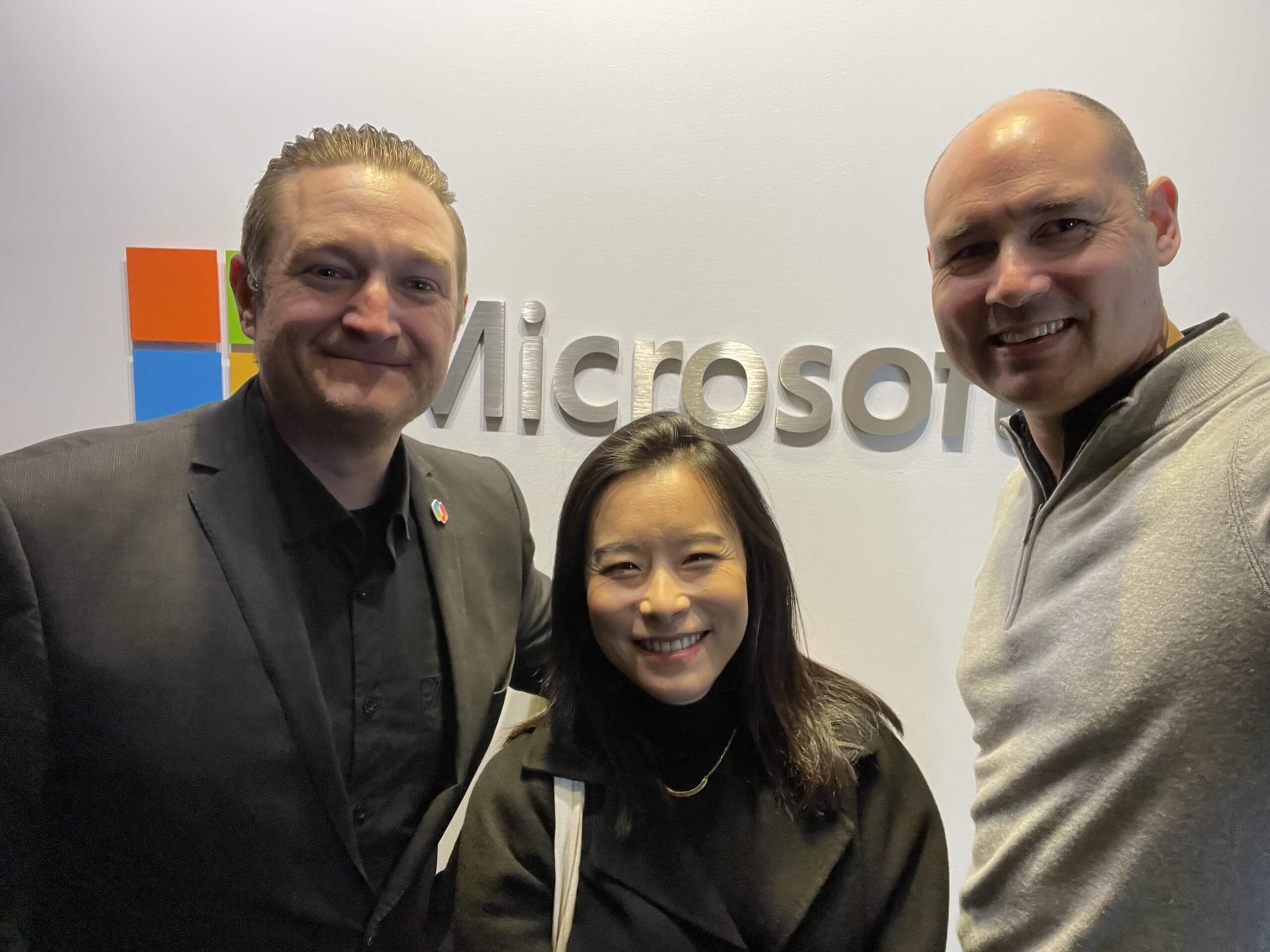 ProServeIT and Microsoft leaders in front at the Microsoft Calgary office logo