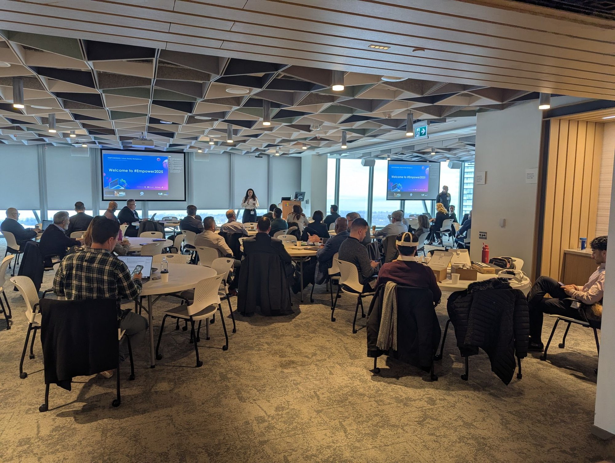 Attendees participating in Empower2025, ProServeIT's annual nonprofit event featuring presentations and discussions on AI, technology innovation, and business transformation.