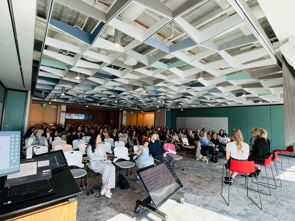 Panel discussion and audience participation during ProServeIT's EmpowerWomen event, connecting professionals through leadership insights and networking opportunities.