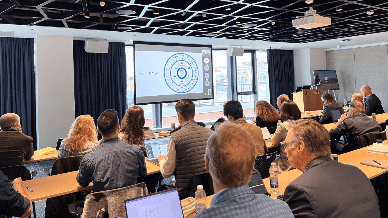 ProServeIT hosting an AI Copilot executive briefing session in Vancouver with a full room of senior leaders and executives