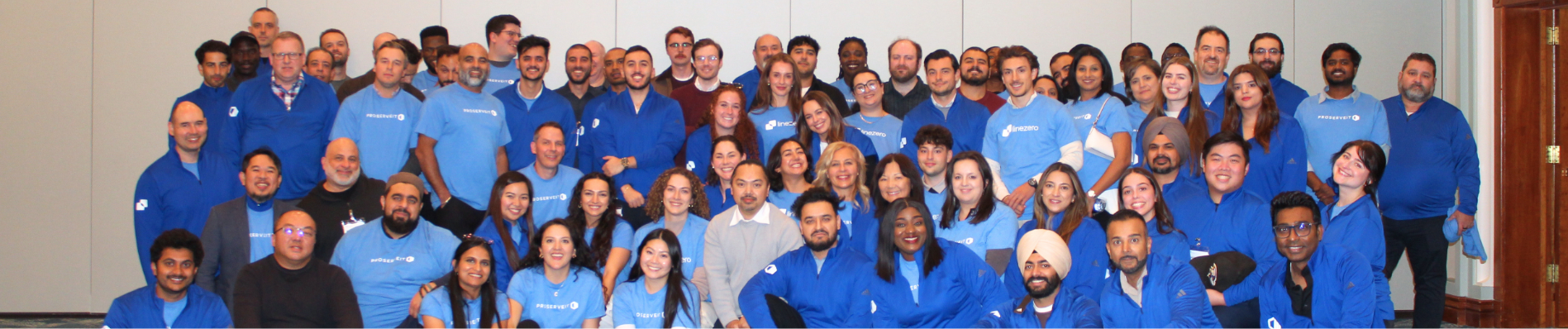 The ProServeIT and Linezero teams gathered together at their 2026 annual meeting, wearing branded blue shirts, representing the people behind the relationships, care, and hospitality-driven culture that has defined ProServeIT since 2002
